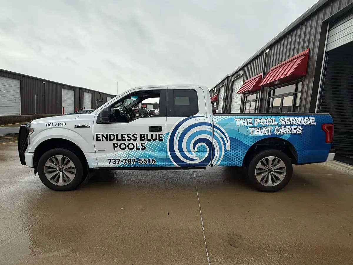 Endless Blue Pools branded service truck — The Pool Service That Cares — in Round Rock, TX